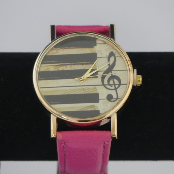 Horloge goudkleurige kast pianotoetsen g-sleutel fuchsia roze band gadgets voor gitaar en muziek cadeau kind